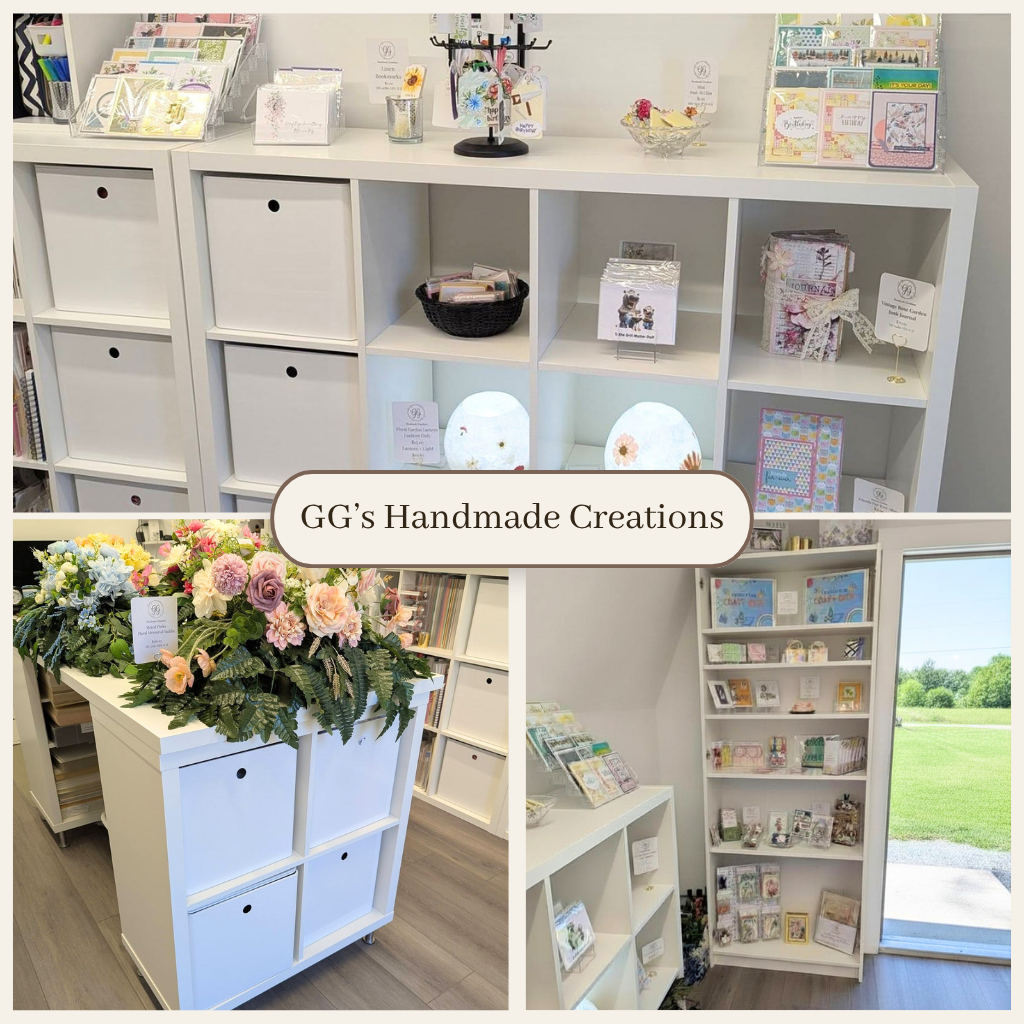 GG's Handmade Creations studio in Scotch Village Nova Scotia — handmade greeting cards, journals, and floral memorial arrangements displayed on white shelving
