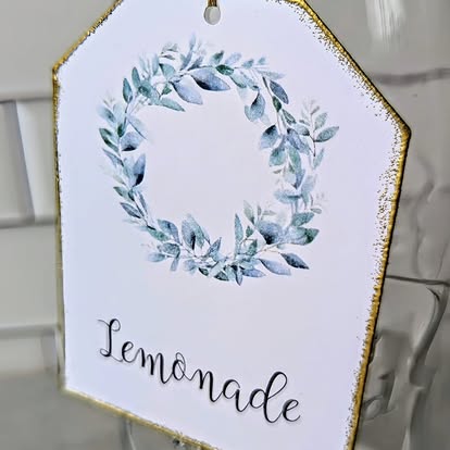 Folded blackberries food label with eucalyptus foliage and gold-toned border