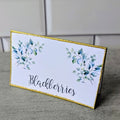 Coordinating eucalyptus wedding shower mimosa bar sign, lemonade tag and food label