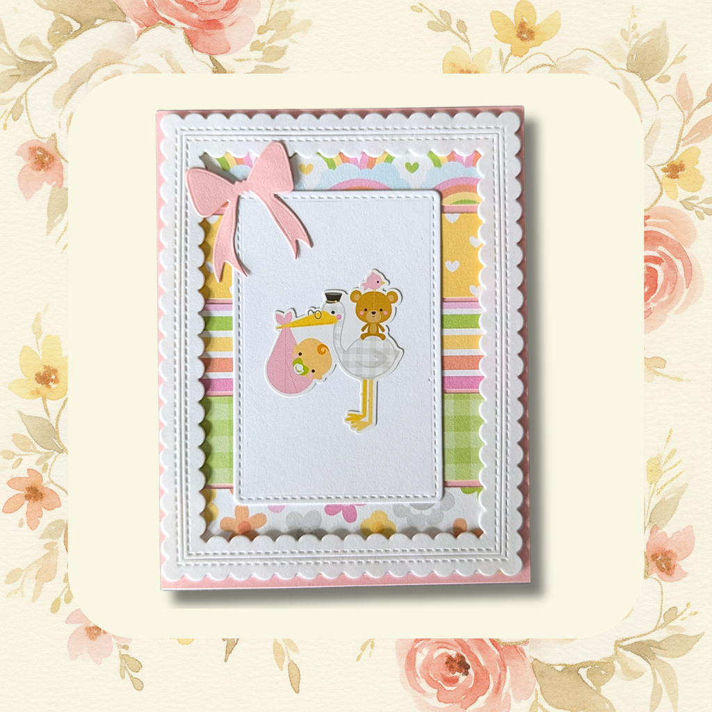 Handmade stork and bear baby girl new baby greeting card with pink bow, white scalloped border and colourful striped patterned papers on blush floral background