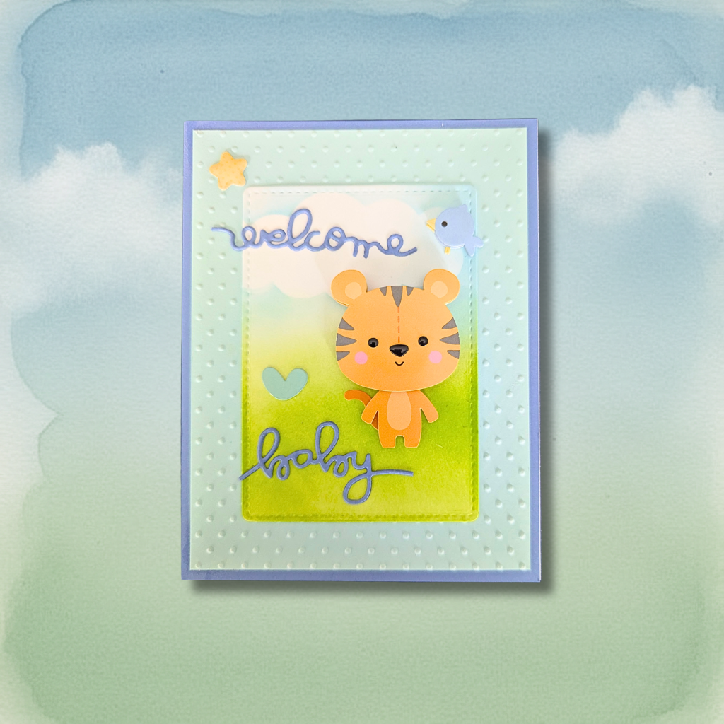 Welcome Baby Tiger Greeting Card with tiger cub die-cut on green gradient panel with periwinkle blue mat and cloud background