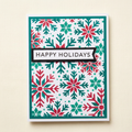 Red and teal snowflake Happy Holidays Christmas greeting card with a teal border.